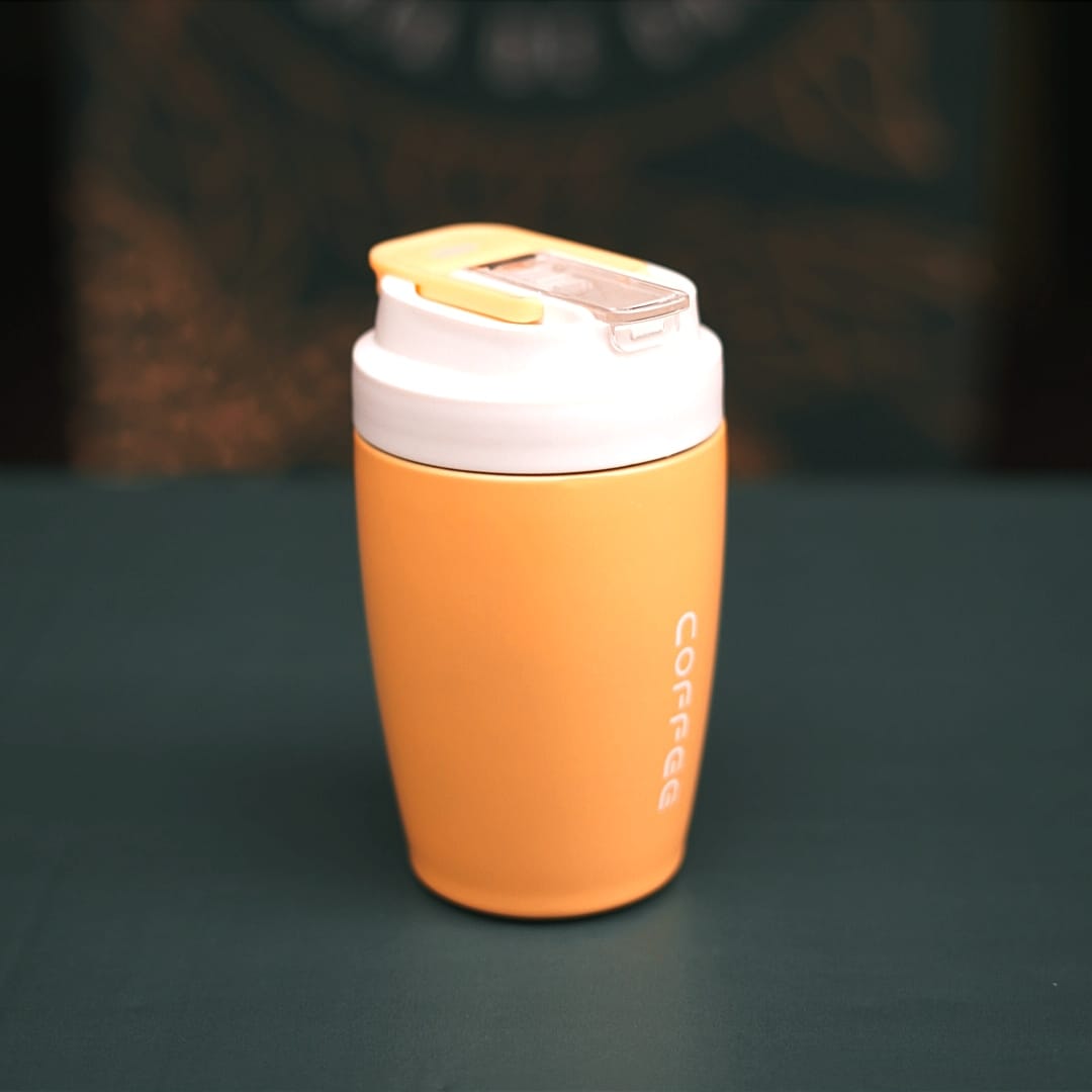 Termo naranja con vaso térmico